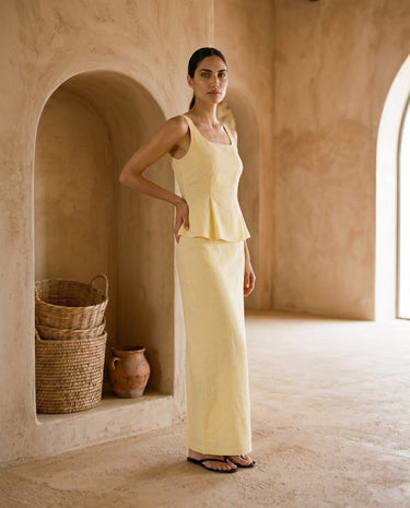 Yellow two-piece set on model, relaxed front view – Moriel Heritage