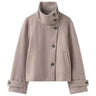 Ottilie Funnel Jacket in taupe, front flat lay on white showing the buttoned funnel collar and cuff tabs