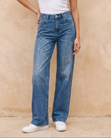 Sloane Straight Leg Jeans in blue — front view on model
