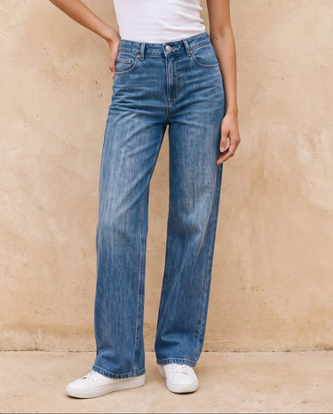 Sloane Straight Leg Jeans in blue — front view on model
