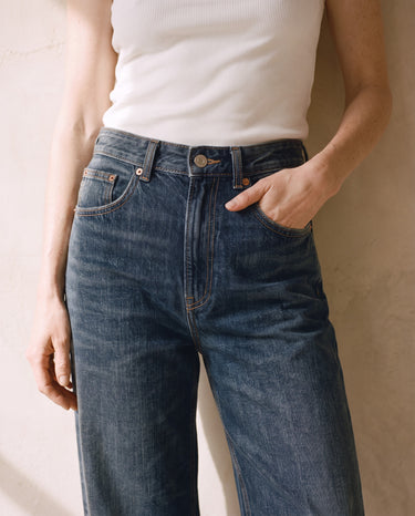 Close-up of the Delphine Wide Leg Jeans waistband, fly, copper rivets and coin pocket