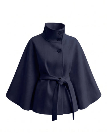 The Lorenne cape coat in navy — belted wool cape with stand collar, product flat lay