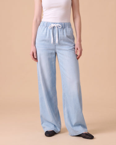Isla Stretch Denim Jeans in Light Blue - wide leg pull-on stretch denim on model