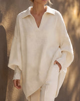The Lorna Collared Knit in ivory — oversized batwing poncho pullover with polo collar and V-neck, worn on model