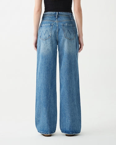 Back view of Hallie Jeans showing M-stitch back pockets and wide straight leg