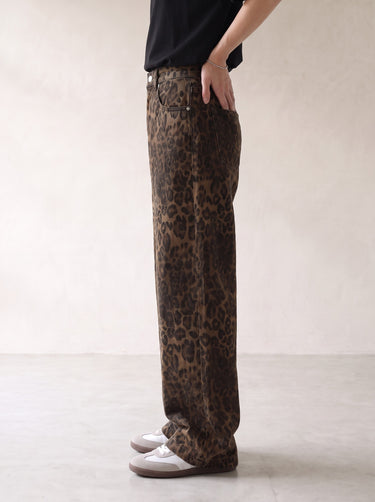 Leopard print wide-leg jeans, side profile