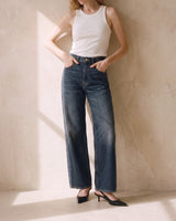 Delphine Wide Leg Jeans worn with thumbs in the front pockets