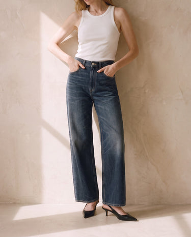 Delphine Wide Leg Jeans worn with thumbs in the front pockets