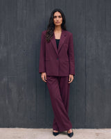The Aliya Burgundy Blazer Set in burgundy — full suit, front view on model