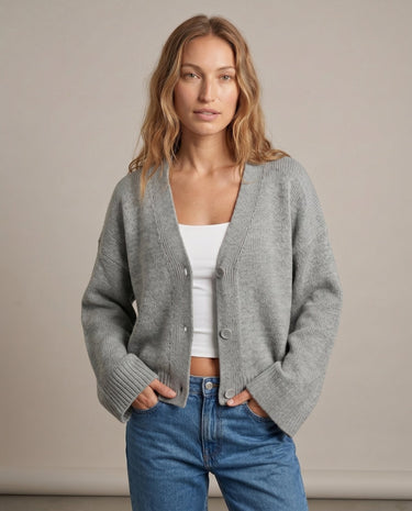 Gray knit cardigan on model, hands in pockets – Moriel Heritage