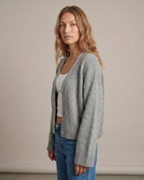 Gray knit cardigan on model, side view – Moriel Heritage