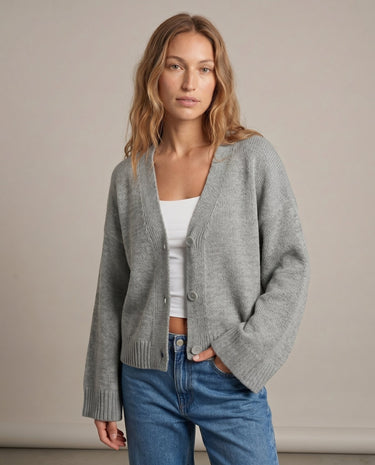Gray knit cardigan on model, front view with jeans – Moriel Heritage