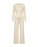 Amarie Set in cream — ribbed knit button-front cardigan and matching wide-leg drawstring trousers, flat-lay