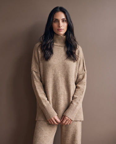 Arden Knit Lounge Set in khaki — waist-up front view on model showing the ribbed cuffs