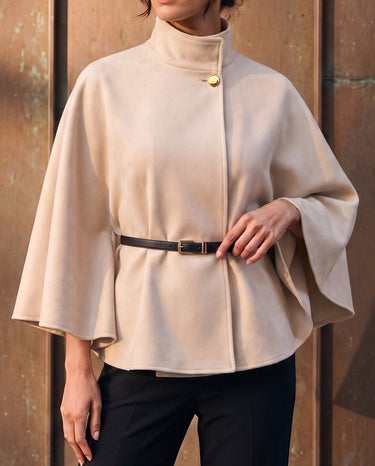 The Aurelia Shawl in beige — front view on model
