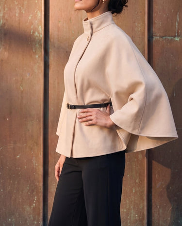 The Aurelia Shawl in beige — side view on model