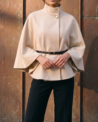 The Aurelia Shawl in beige — front view on model