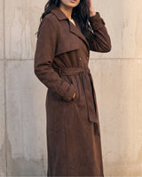 Side view of the brown Bexley Trench Coat showing the suede-look drape and belted waist