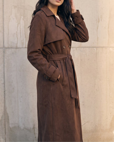 Side view of the brown Bexley Trench Coat showing the suede-look drape and belted waist