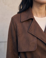 Close-up of the Bexley Trench Coat's wide notch lapel and suede-look texture in brown