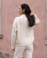 Boat Neck Cable Knit Sweater in white — back view on model