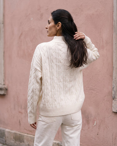 Boat Neck Cable Knit Sweater in white — back view on model