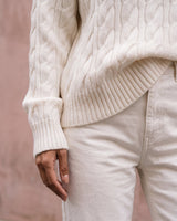 Boat Neck Cable Knit Sweater in white — close-up of the ribbed cuff