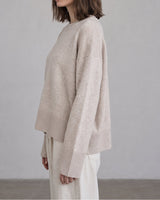 Beige Cali Knit on model, side view – Moriel Heritage