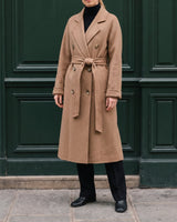The Calvera double-breasted wool coat in khaki — front view on model