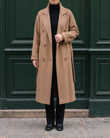 The Calvera double-breasted wool coat in khaki — front view on model