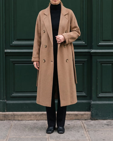 The Calvera double-breasted wool coat in khaki — front view on model
