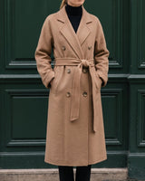 The Calvera double-breasted wool coat in khaki — front view on model