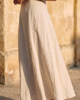 Camille Strapless Cotton Maxi Dress in khaki — close-up of cotton skirt drape and hem