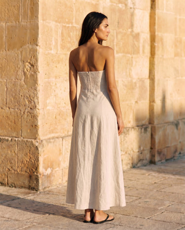 Camille Strapless Cotton Maxi Dress in khaki — strapless A-line maxi dress, back view on model