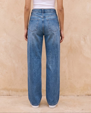 Sloane Straight Leg Jeans in blue — back view on model