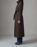 Henrietta Coat in brown, side view of the tall funnel collar and long straight silhouette