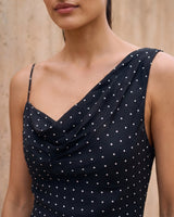 The Elowen Polka Dot Dress in black polka dot — close-up of the cowl neckline and polka-dot fabric