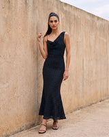 The Elowen Polka Dot Dress in black polka dot — slip maxi dress, front view on model