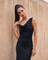 The Elowen Polka Dot Dress in black polka dot — slip maxi dress, front view on model
