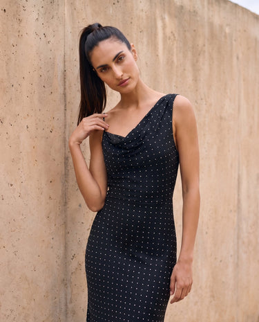 The Elowen Polka Dot Dress in black polka dot — slip maxi dress, front view on model
