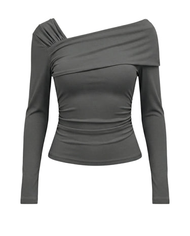 Grey long-sleeve top with an asymmetric draped one-shoulder neckline, flat lay on white – Moriel Heritage