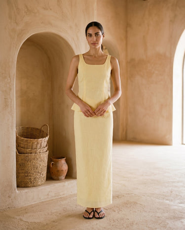 Yellow strap top and maxi skirt set on model, front view – Moriel Heritage
