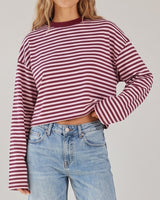 Everyday Stripe in burgundy and pink — boxy striped top worn with jeans, front view on model