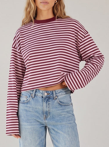 Everyday Stripe in burgundy and pink — boxy striped top worn with jeans, front view on model