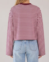 Everyday Stripe in burgundy and pink — back view on model showing the straight boxy hem