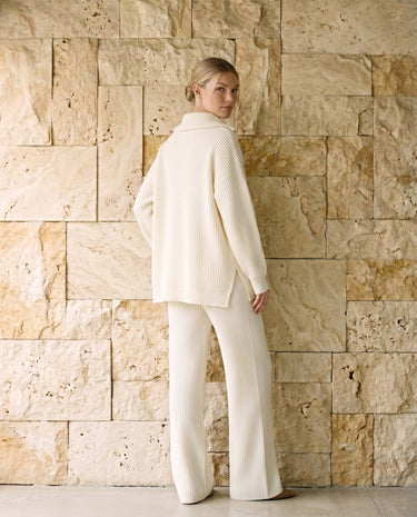 Off White knit set on model, side view – Moriel Heritage