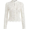 Florence Blouse in white — sheer floral lace blouse with a stand collar and pearl button front, flat-lay