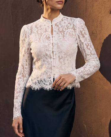Florence Blouse in white — front view showing the fitted body and scalloped lace hem