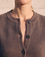 The Frankie Knit Cardi in khaki — close-up of the band collar and off-centre button placket