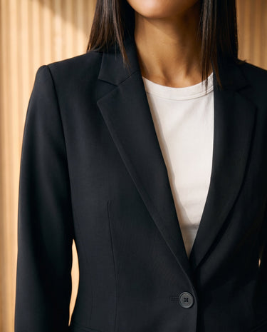 Graciela Cinch Waist Blazer in black — close-up of notch lapel and single-button front